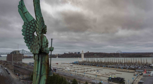 Statue-of-an-Angel-overlooking-Old-Harbour-at-Montreal